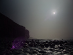 FZ012299-300 Partial solar eclips at Llantwit Major beach.jpg